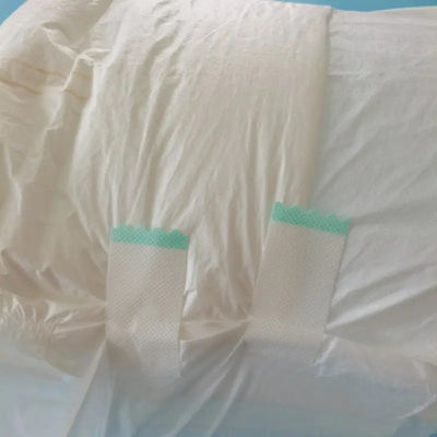 S--XXLサイズで湿度指標付きの快適で吸収性のある成人用テープ尿布